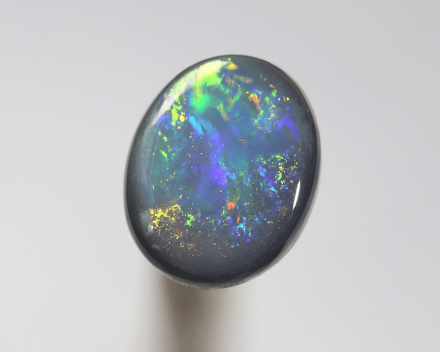 0.87 ct black opal