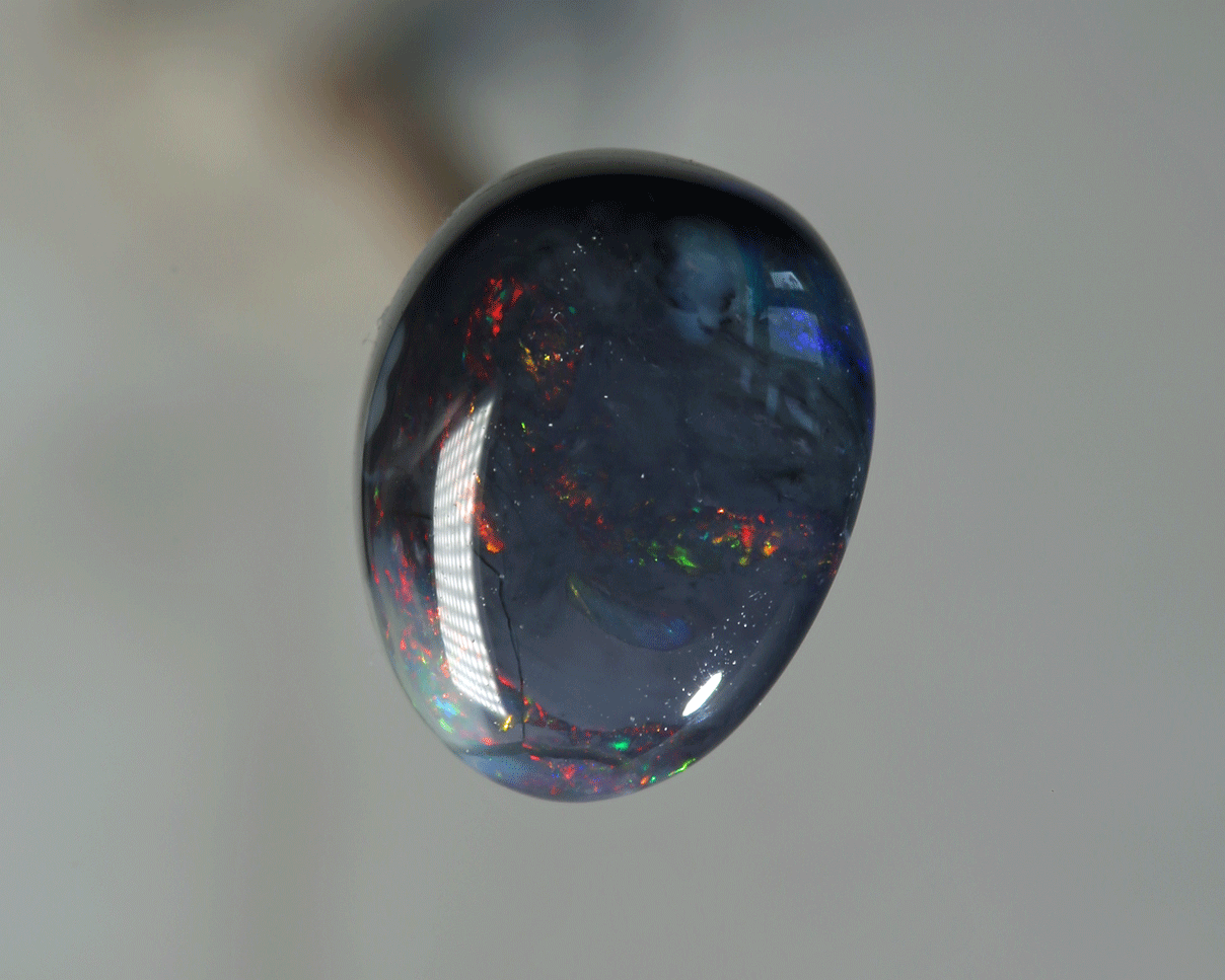 4.9 carats black opal picture stone